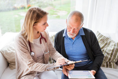 a lady talking to the old man