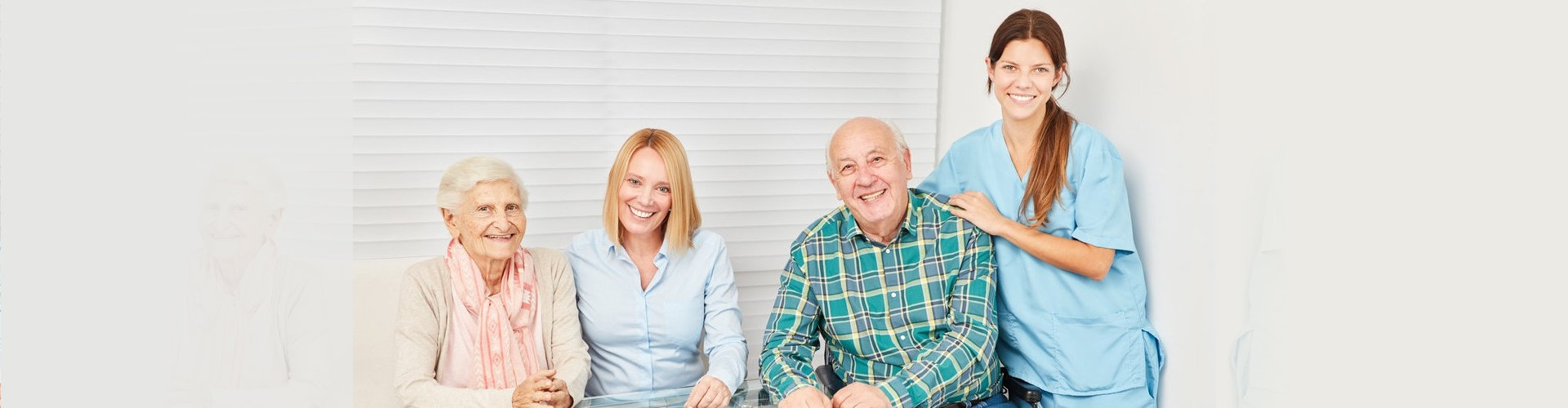 senior couple with caregivers